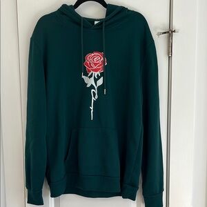 Green Hoodie with Red Rose Design